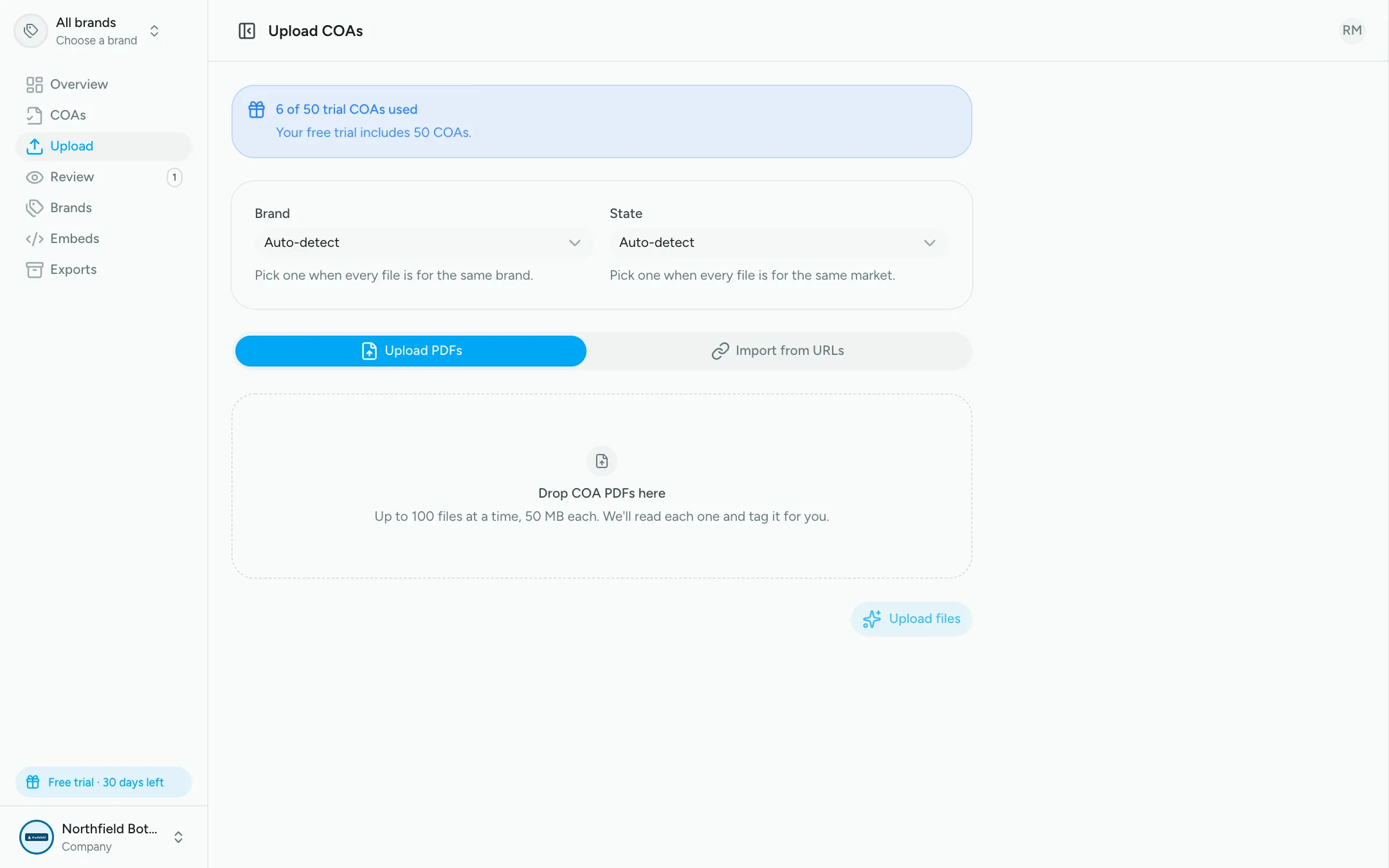 Upload page with brand and state defaults and a drop zone for COA PDFs